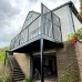 Walk-Out Balcony + Ornate Balustrade